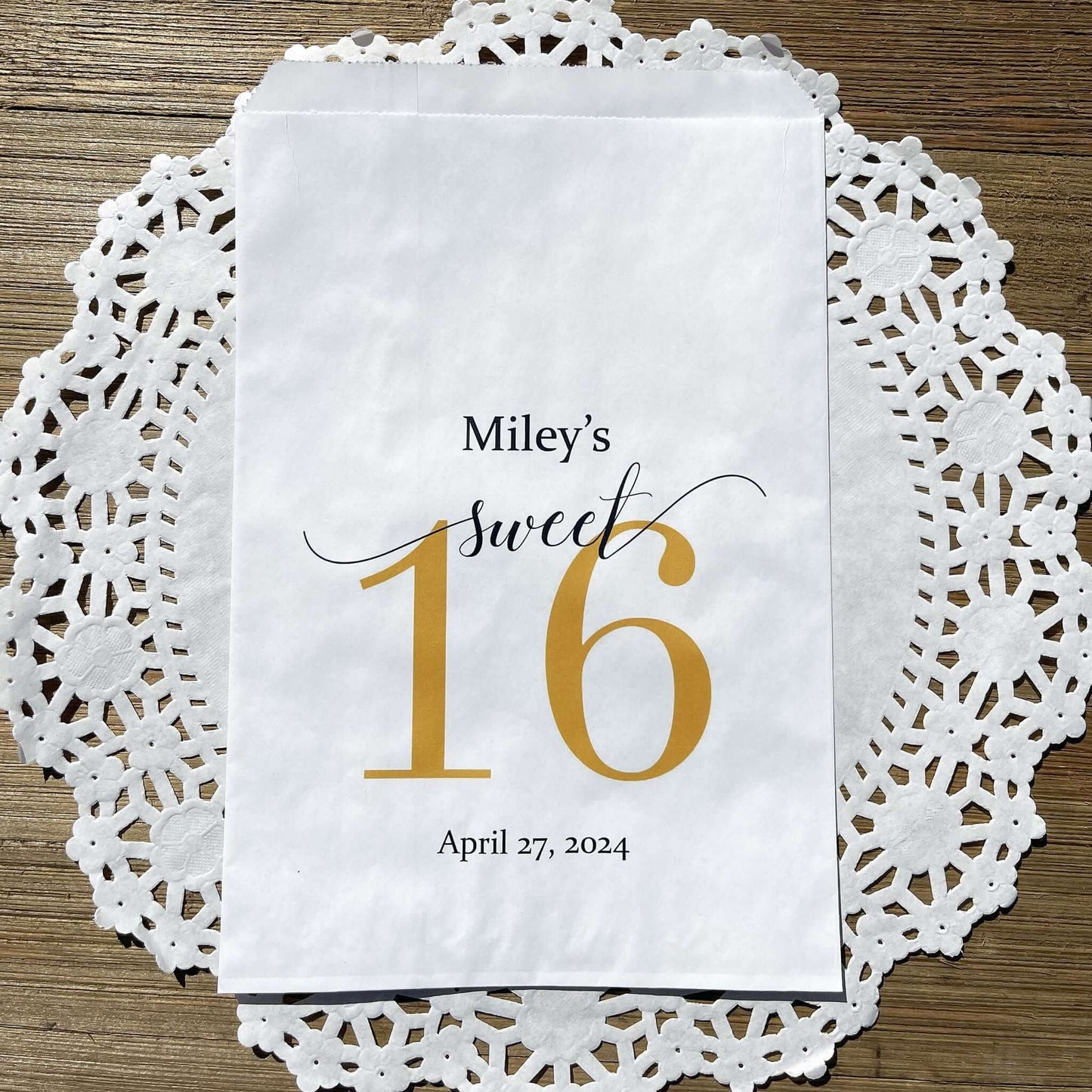 Sweet 16 Candy Bags Personalized, printed with a large sweet 16 and the guest of honors name and party date.  Printed on white bags, large enough for candy, cookies, popcorn or favors.  