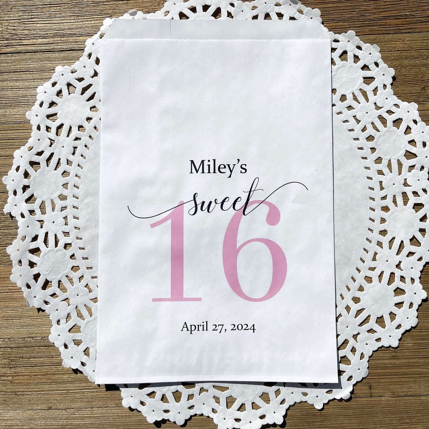 Sweet 16 Candy Bags Personalized, printed with a large sweet 16 and the guest of honors name and party date.  Printed on white bags, large enough for candy, cookies, popcorn or favors.  