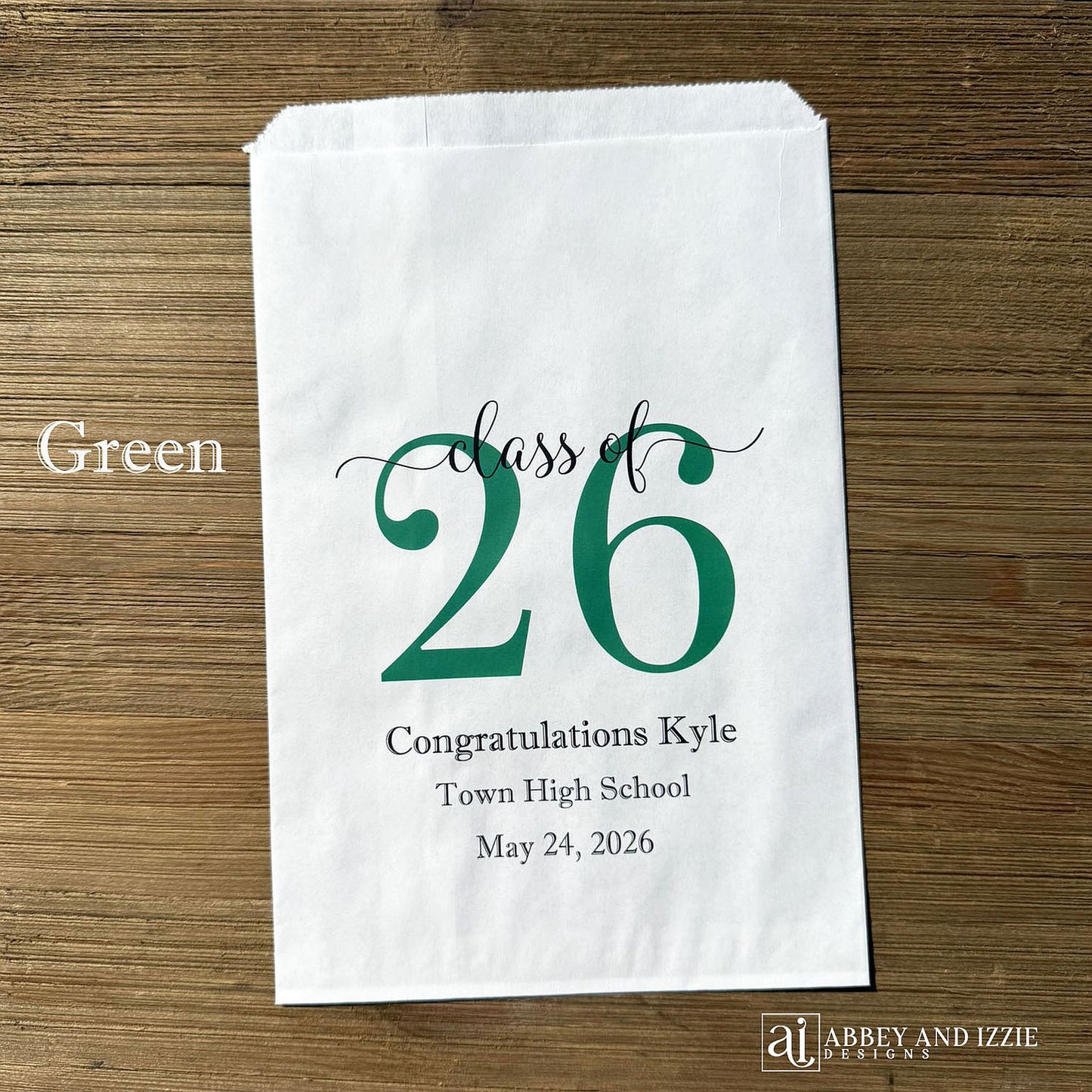 Graduation favor bags for the Class of 2026, perfect size for candy, popcorn, cookies or eating utensils.  White bags personalized for the graduate with class of 26, school name and date.