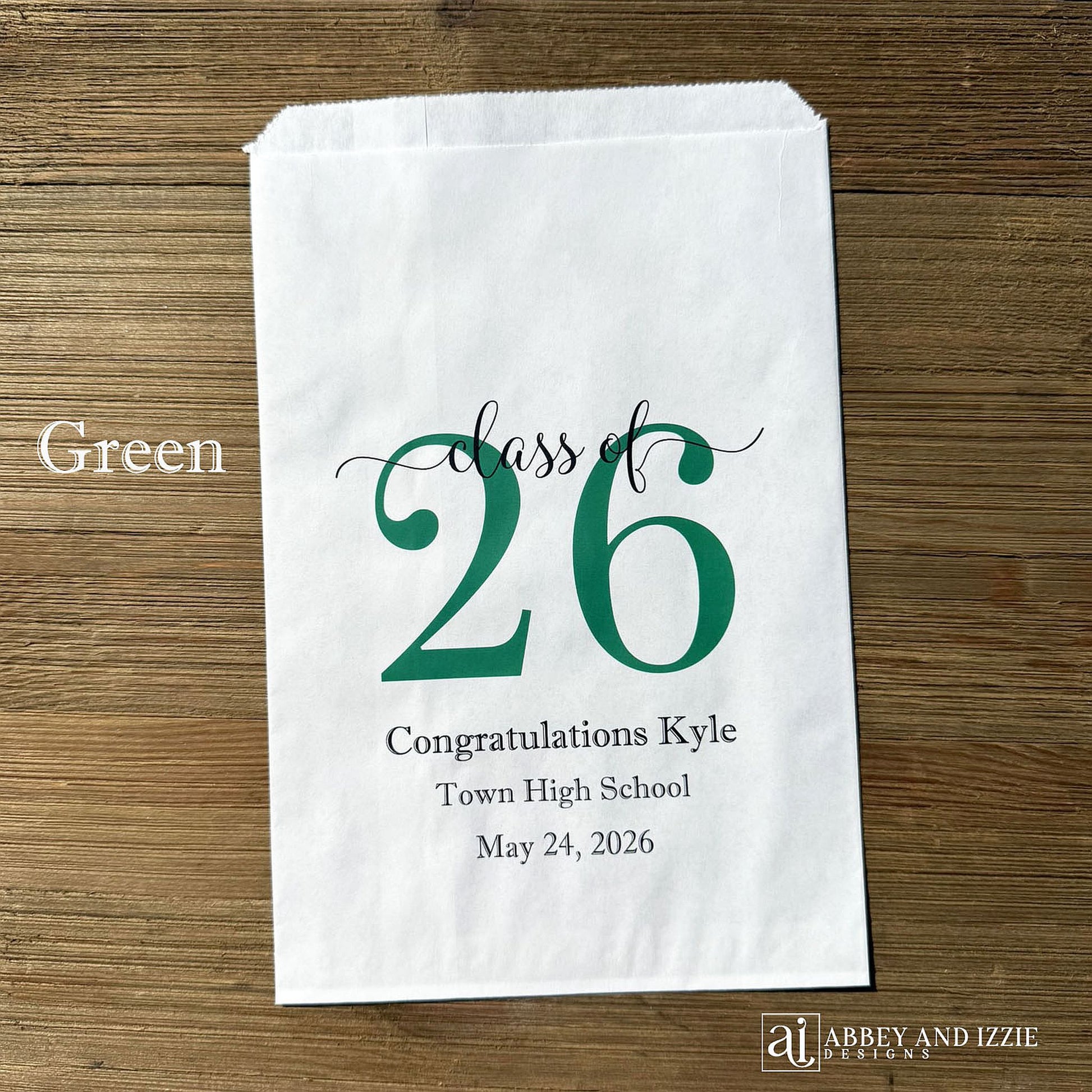 Graduation favor bags for the Class of 2026, perfect size for candy, popcorn, cookies or eating utensils.  White bags personalized for the graduate with class of 26, school name and date.