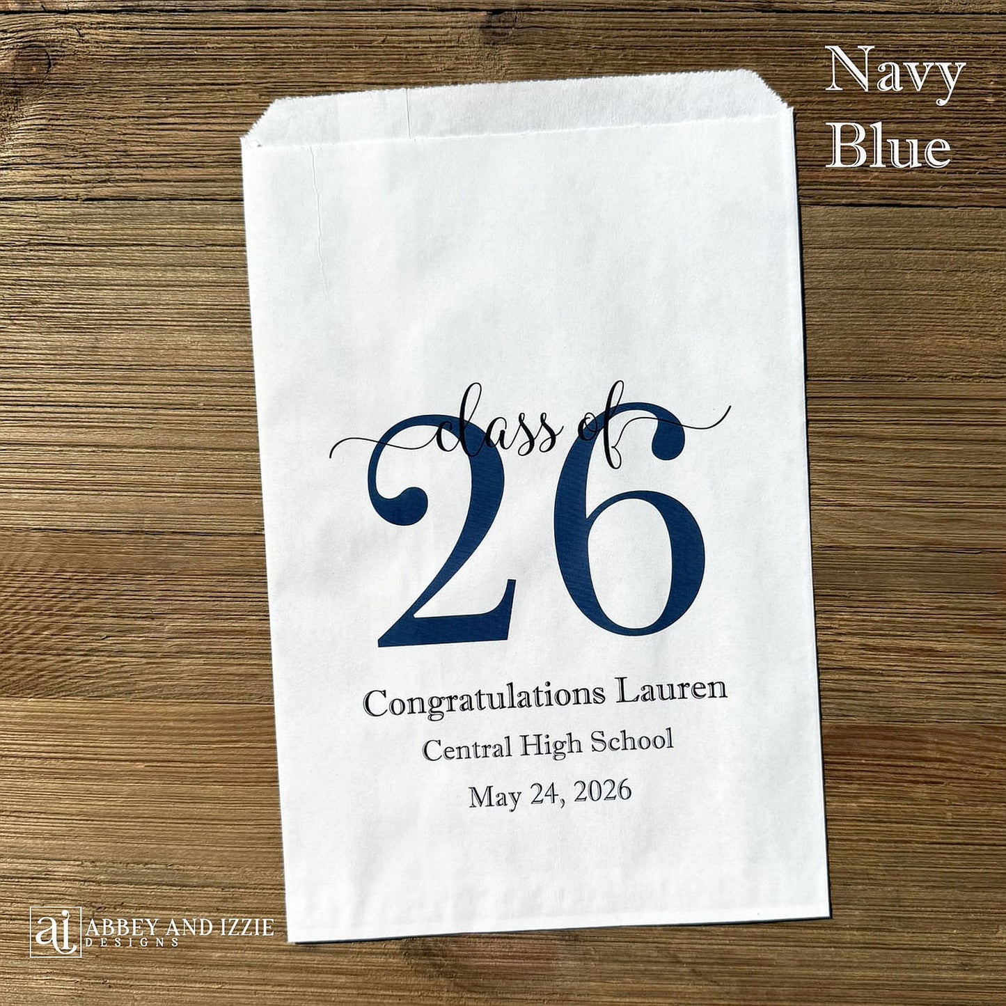 Graduation favor bags for the Class of 2026, perfect size for candy, popcorn, cookies or eating utensils.  White bags personalized for the graduate with class of 26, school name and date.