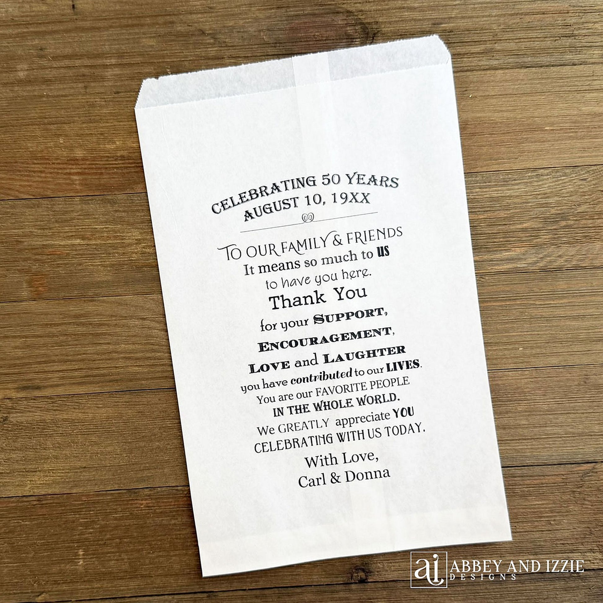 Anniversary Favor Bags Personalized for the honorees.  Printed with a sweet thank you to your guests on white bags.