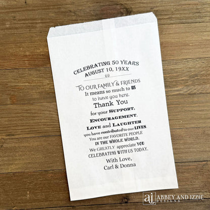 Anniversary Favor Bags Personalized for the honorees.  Printed with a sweet thank you to your guests on white bags.