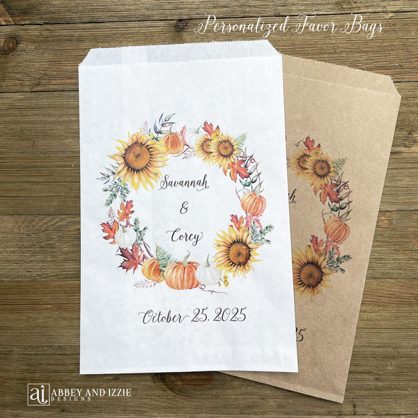 Personalized autumn wedding favor bags, adorned with a fall wreath.  Bags are larger than most and hold lots of goodies.  Your choice of white or brown bags.