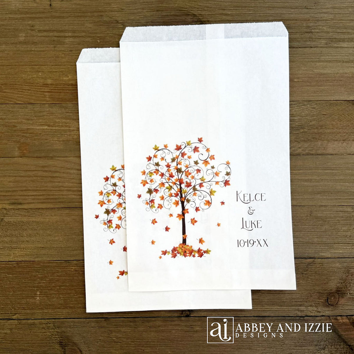 Fall Wedding Favor Bags adorned with a beautiful fall tree and personalized for the special couple.  Bags are larger than most, printed on white bags.