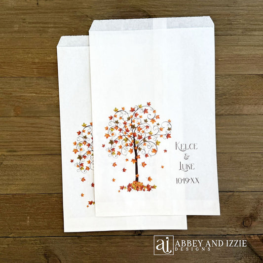 Fall Wedding Favor Bags adorned with a beautiful fall tree and personalized for the special couple.  Bags are larger than most, printed on white bags.