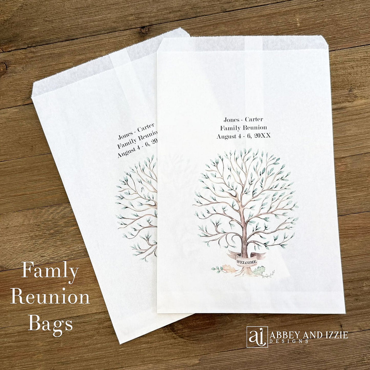 Personalized family reunion favor bags that can be used as utensil bags also.  White bags each is printed with a beautiful tree and personalized with the family name and reunion date.