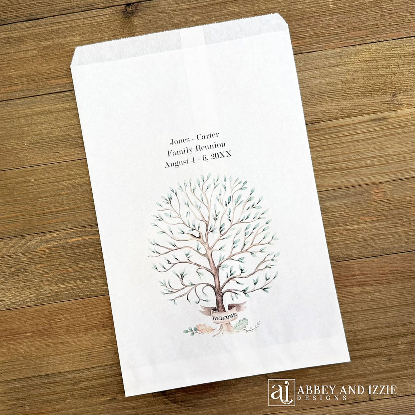 Personalized family reunion favor bags that can be used as utensil bags also.  White bags each is printed with a beautiful tree and personalized with the family name and reunion date.