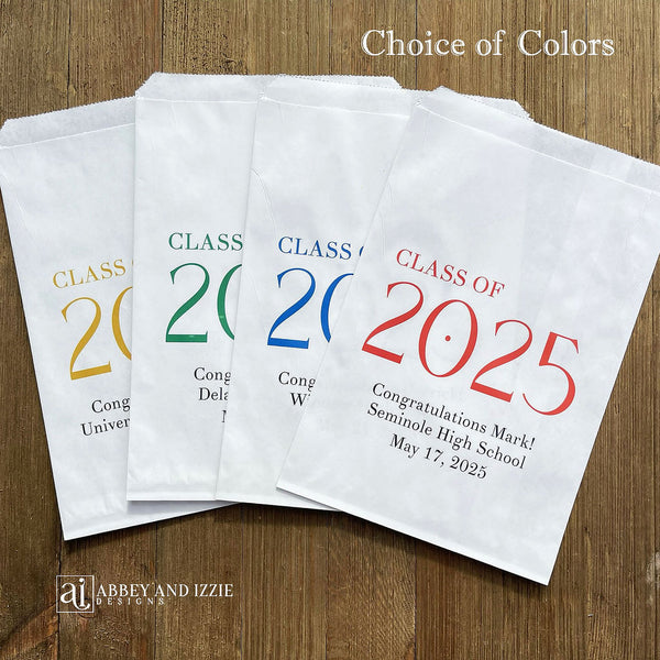 Graduation favor bags printed with class of year in large print.  Each bag is personalized for the graduate with their name, school and party date.  Bags are white and printed with your color choice.  