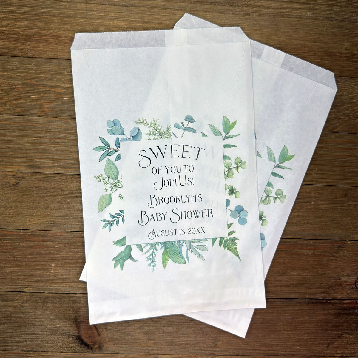 Greenery Baby Shower Favor Bags, personalized for the mother to be.  Printed  on white bags with 'sweet of you to join us' with a greenery frame, these will be perfect for cookie bags or candy buffet bags.