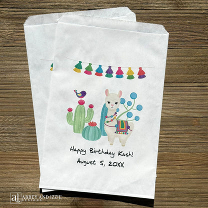 Llama Birthday Party Favor Bags personalized for the guest of honor.  Printed on white bags with a colorful llama and cactus.