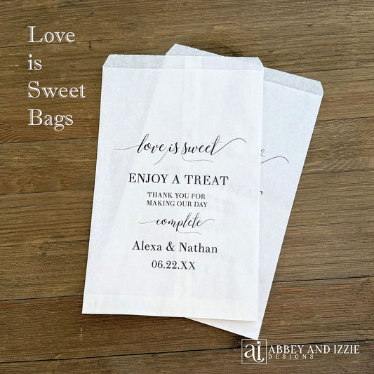 Love is Sweet Wedding Candy Bags, personalized for the bride and groom.  Your choice of white or brown bags, perfect size bags for a candy buffet.