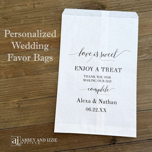 Love is Sweet Wedding Candy Bags, personalized for the bride and groom.  Your choice of white or brown bags, perfect size bags for a candy buffet.