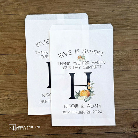 Monogrammed Fall Wedding Favor Bags, perfect for fall weddings.  Adorned with fall accents they will fit your fall wedding theme perfect.  Personalized for the bride and groom and large initial.  