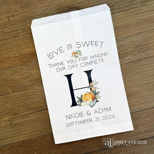 Monogrammed Fall Wedding Favor Bags, perfect for fall weddings.  Adorned with fall accents they will fit your fall wedding theme perfect.  Personalized for the bride and groom and large initial.  