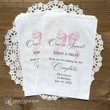 Celebrate your little one's special day with these charming , Girls Birthday Favor Bags with a Pink Bow printed on white bags , personalized for the guest of honor.