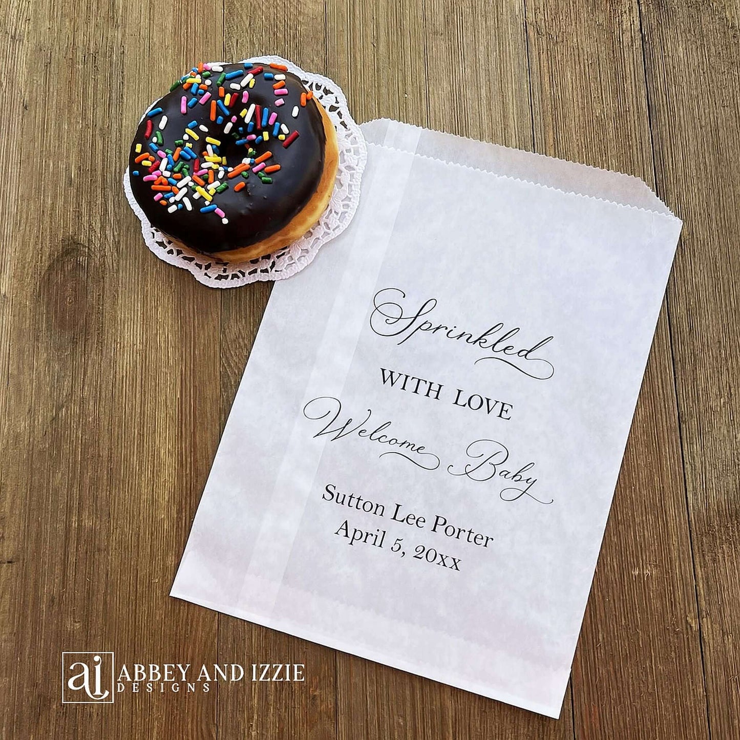 Glassine baby sprinkle favor bags, personalized for the guest of honor.  Bags are glassine and grease resistant.  Larger than most favor bags they measure 6 x 9.  Perfect for donuts, cookies or any sweet treats.