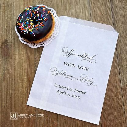 Glassine baby sprinkle favor bags, personalized for the guest of honor.  Bags are glassine and grease resistant.  Larger than most favor bags they measure 6 x 9.  Perfect for donuts, cookies or any sweet treats.