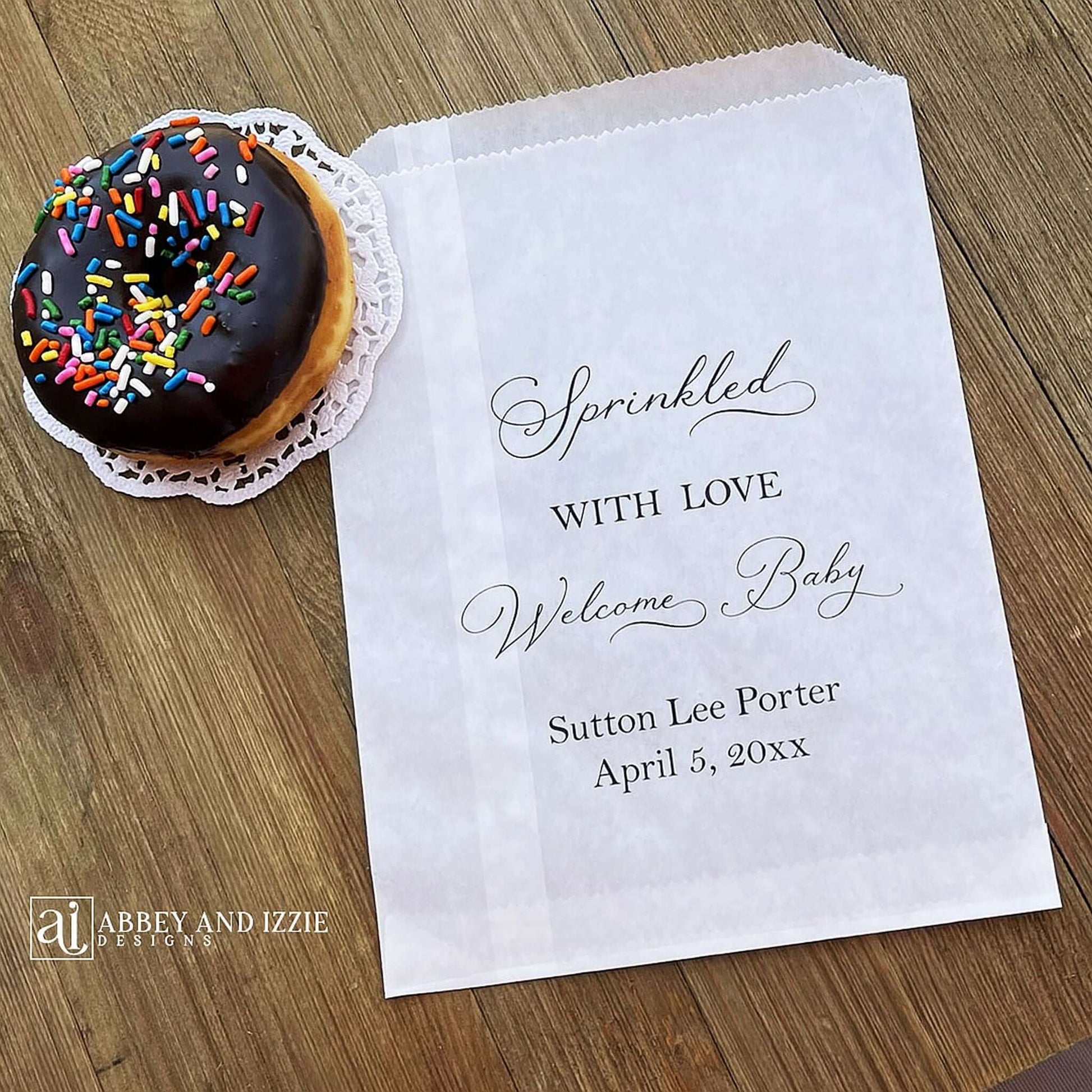 Glassine baby sprinkle favor bags, personalized for the guest of honor.  Bags are glassine and grease resistant.  Larger than most favor bags they measure 6 x 9.  Perfect for donuts, cookies or any sweet treats.