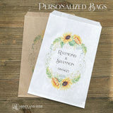 Sunflower Favor Bags that are personalized for the bride and groom.  Adorned with a sunflower wreath around the names and wedding date.  Your choice of white or brown bags. 