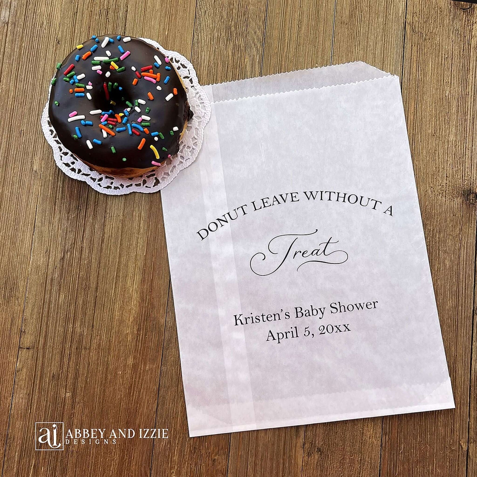 Our personalized donut bags for a baby shower are sure to impress your guests. Printed with 'donut leave without a treat' with the mother to be's name and event date. Bags are glassine so grease resitant, perfect for a donut bar or donut wall.