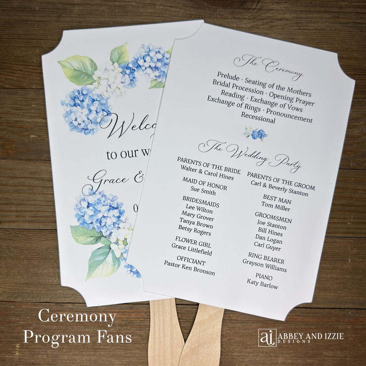 Elevate your wedding ambiance with our personalized blue hydrangea program fans, beautifully crafted to complement your special day.  Printed on white card stock with 'welcome to our wedding' and the bride and grooms names with wedding date printed. 