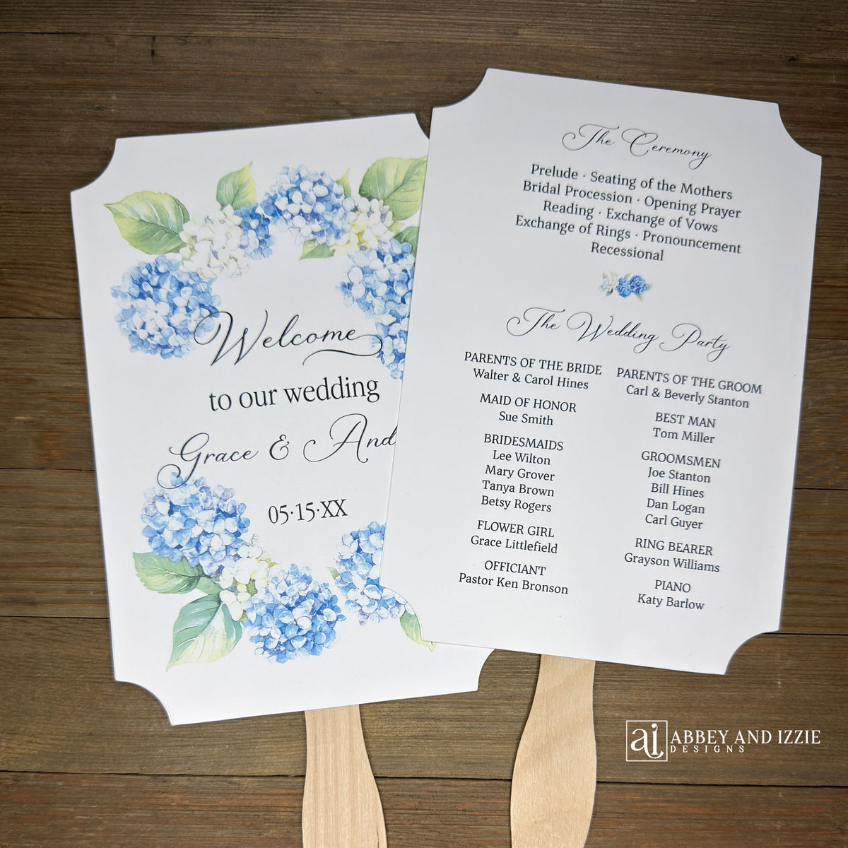 Elevate your wedding ambiance with our personalized blue hydrangea program fans, beautifully crafted to complement your special day.  Printed on white card stock with 'welcome to our wedding' and the bride and grooms names with wedding date printed. 