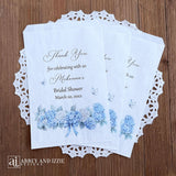 Personalized blue hydrangea bridal shower favors bags, perfect for a small gift of appreciation or a cookie bar or even a candy bar.  White bags adorned with delicate blue hydrangeas for a sweet addition to your event.