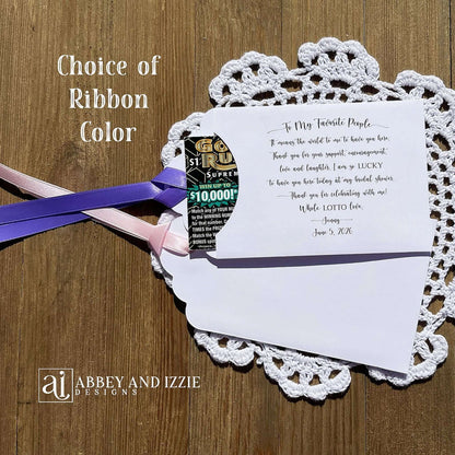 Personalized unique bridal shower favors, printed on white card stock envelopes with ribbon attached. Ribbon is included, your choice of color. Slide a lottery ticket in to see who goes home the winner.