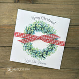 Perfect for holiday gatherings, these personalized gift envelopes add a thoughtful touch for guests, friends or customers. Each 5" × 5" envelope is printed on premium white card stock and arrives fully assembled with ribbon attached ready to slide a lottery ticket or gift card inside. Customize with "Merry Christmas" or "Happy Holidays" and personalize with names or business, your choice of red checked or black checked ribbon.