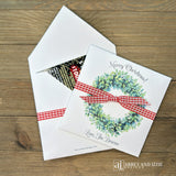Perfect for holiday gatherings, these personalized gift envelopes add a thoughtful touch for guests, friends or customers. Each 5" × 5" envelope is printed on premium white card stock and arrives fully assembled with ribbon attached ready to slide a lottery ticket or gift card inside. Customize with "Merry Christmas" or "Happy Holidays" and personalize with names or business, your choice of red checked or black checked ribbon.