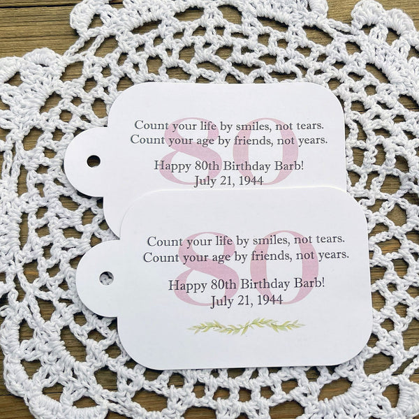 These colorful birthday party tags will a special touch to your favors.  Each is personalized for the guest of honor with a sweet saying.  Printed on white card stock they come with hole punched for easy attaching.  These can be made for any milestone birthday.