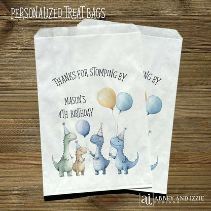 Thanks for Stompling By!  Our dinosaur treat bags are sure to be a hit, adorned with cute dinosuars with hats and balloons to celebrate the honoree.  Personalized with the childs name and birthday year.  Printed on white bags these are colorful and fun!