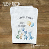 Thanks for Stompling By!  Our dinosaur treat bags are sure to be a hit, adorned with cute dinosuars with hats and balloons to celebrate the honoree.  Personalized with the childs name and birthday year.  Printed on white bags these are colorful and fun!