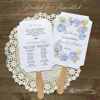 Elevate your wedding ceremony with these elegant blue hydrangea wedding program fans. Designed to keep guests comfortable and informed, each fan features delicate hydrangea artwork in soothing blue tones printed on white card stock.  Fans are two sided with wooden handle hidden between and ship to you assembled.