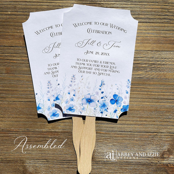 Dusty blue wedding fans personalized for that elegant touch.  Printed on white card stock, two sided with handle hidden they arrive fully assembled for your special day.