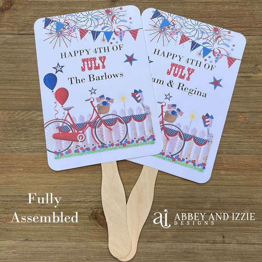 Your guests will thank you for the cool breeze these Personalized 4th of July Fans will bring.  With red, white and blue accents fans are printed on white card stock, two sided with hand hidden between.  They ship fully assembled and ready for your event.