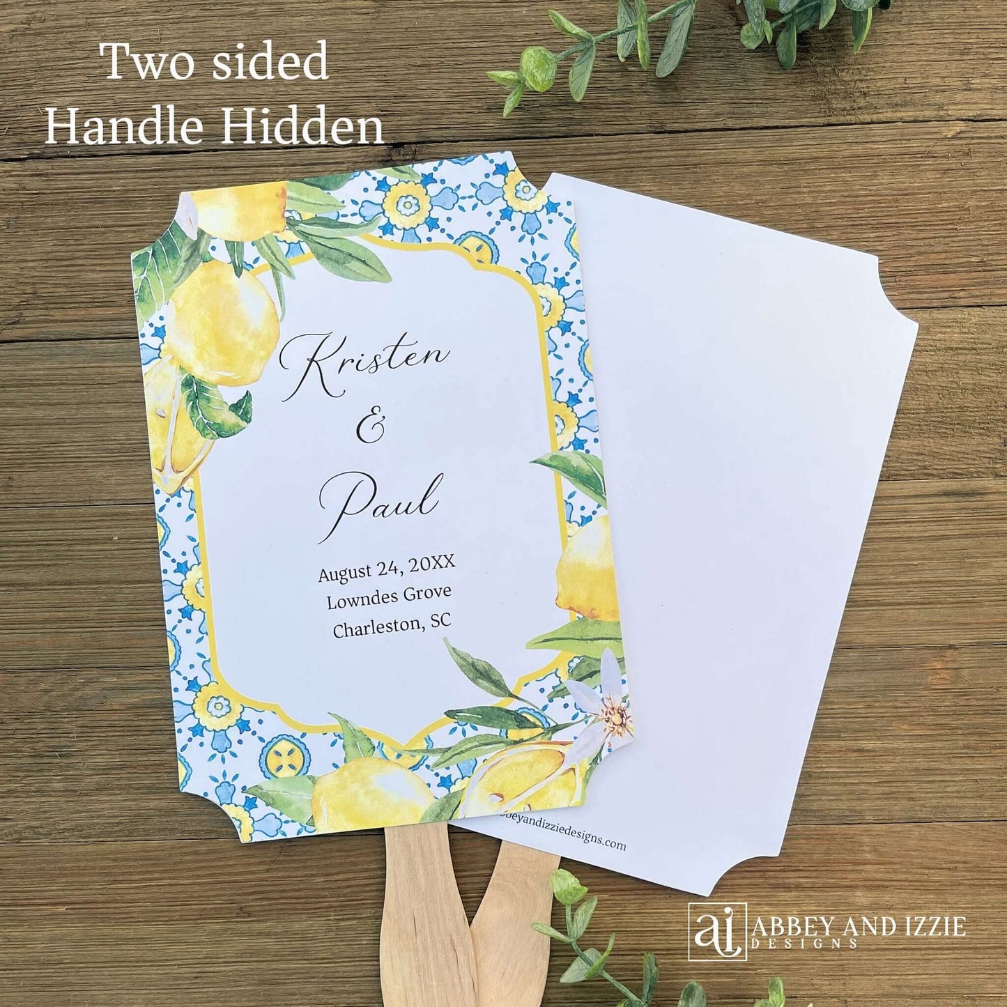 Our Amalfi Coast wedding fans personalized are printed on white stock adorned with lemons and blue tiles to match your Mediterranean Theme wedding.  Fans are personalized for the bride and groom, two sided with handle hidden between.  They come fully assembled and ready for your special day.
