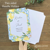 Our Amalfi Coast Wedding Fans are printed on white stock adorned with lemons and blue tiles to match your Mediterranean Theme wedding.  Fans are personalized for the bride and groom, two sided with handle hidden between.  They come fully assembled and ready for your special day.