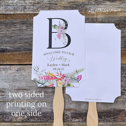 Tropical themed wedding fans monogrammed that are personalized with your large initial, bride and grooms names and wedding date. Adorned with tropical flowers, printed on white card stock. A great keepsake to take home as well as keeping your guests comfortable. Perfect for destination weddings.