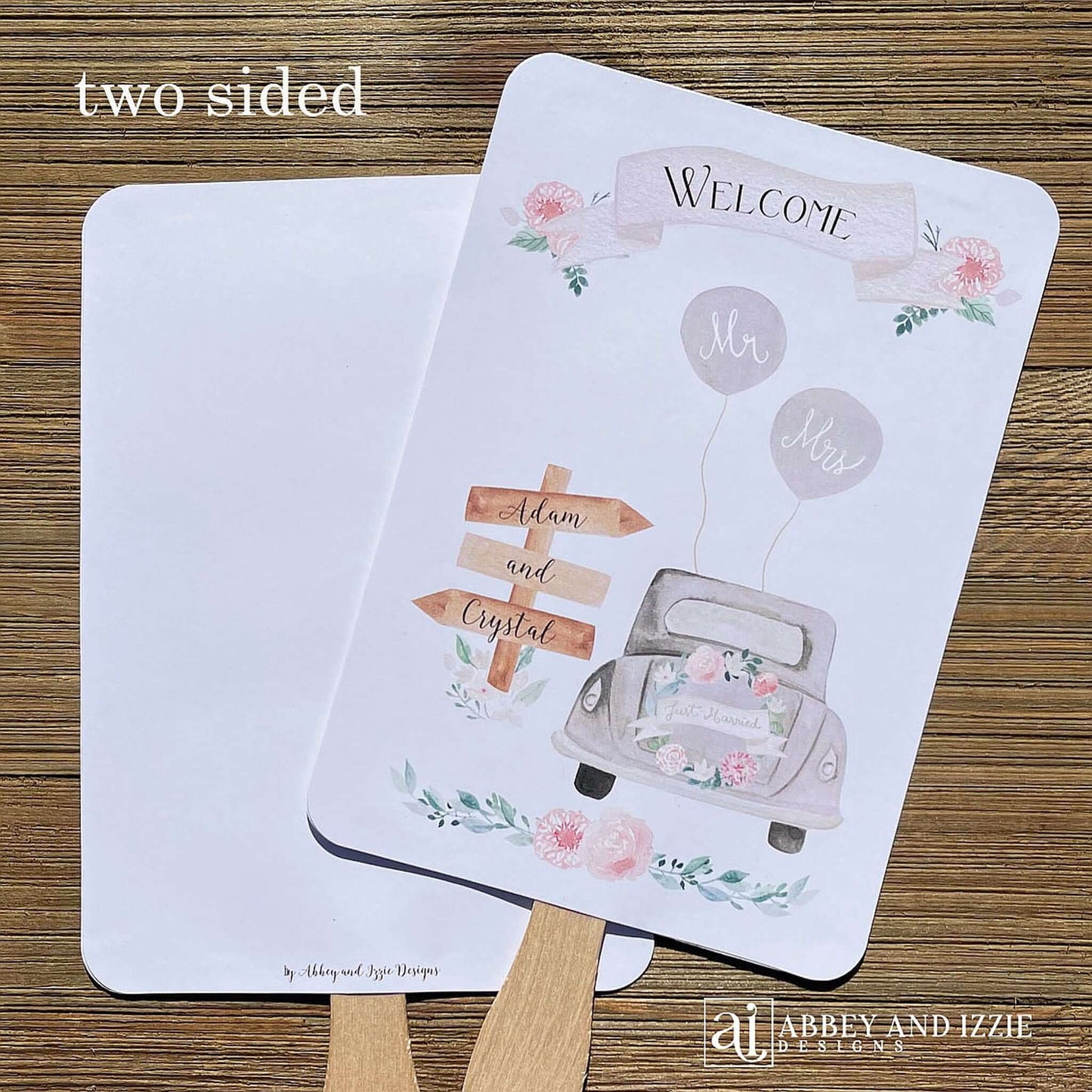 Fun Wedding Fans Personalized for the bride and groom.  Printed with Welcome and a old car with 'just married' on the back.  Fans ship fully assembled and ready for your wedding day.