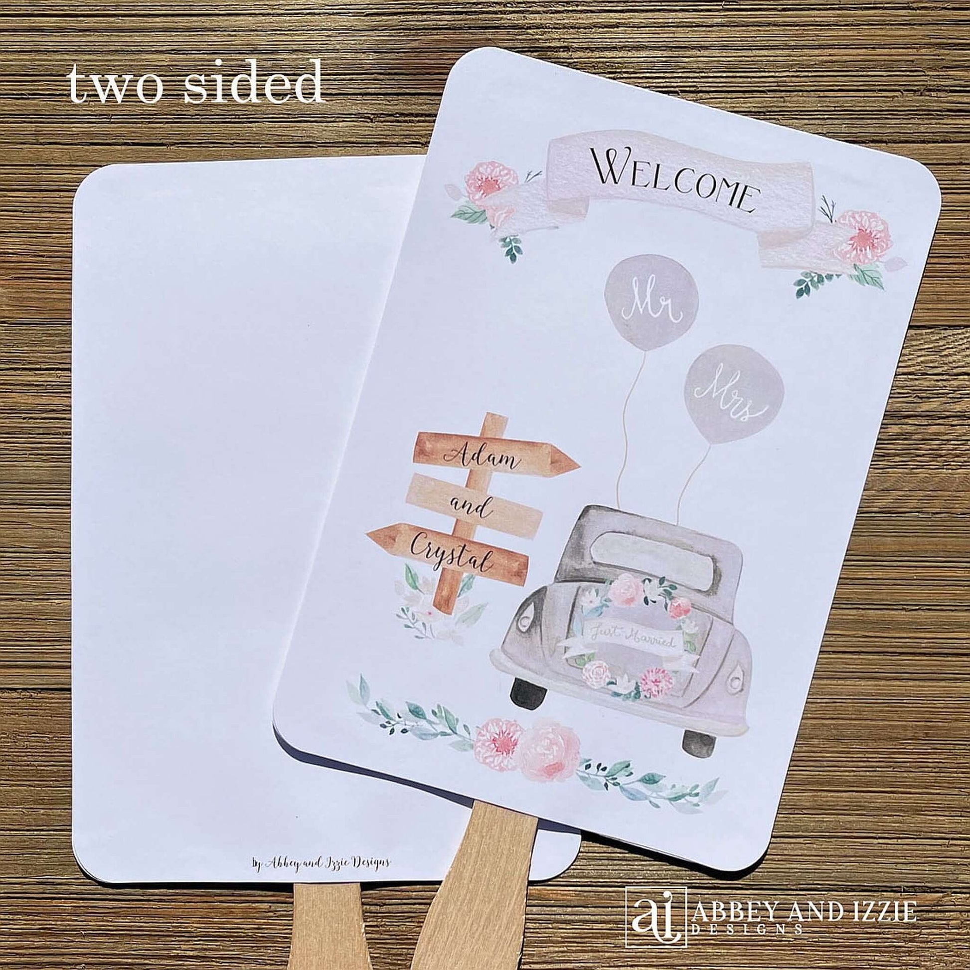 Fun Wedding Fans Personalized for the bride and groom.  Printed with Welcome and a old car with 'just married' on the back.  Fans ship fully assembled and ready for your wedding day.