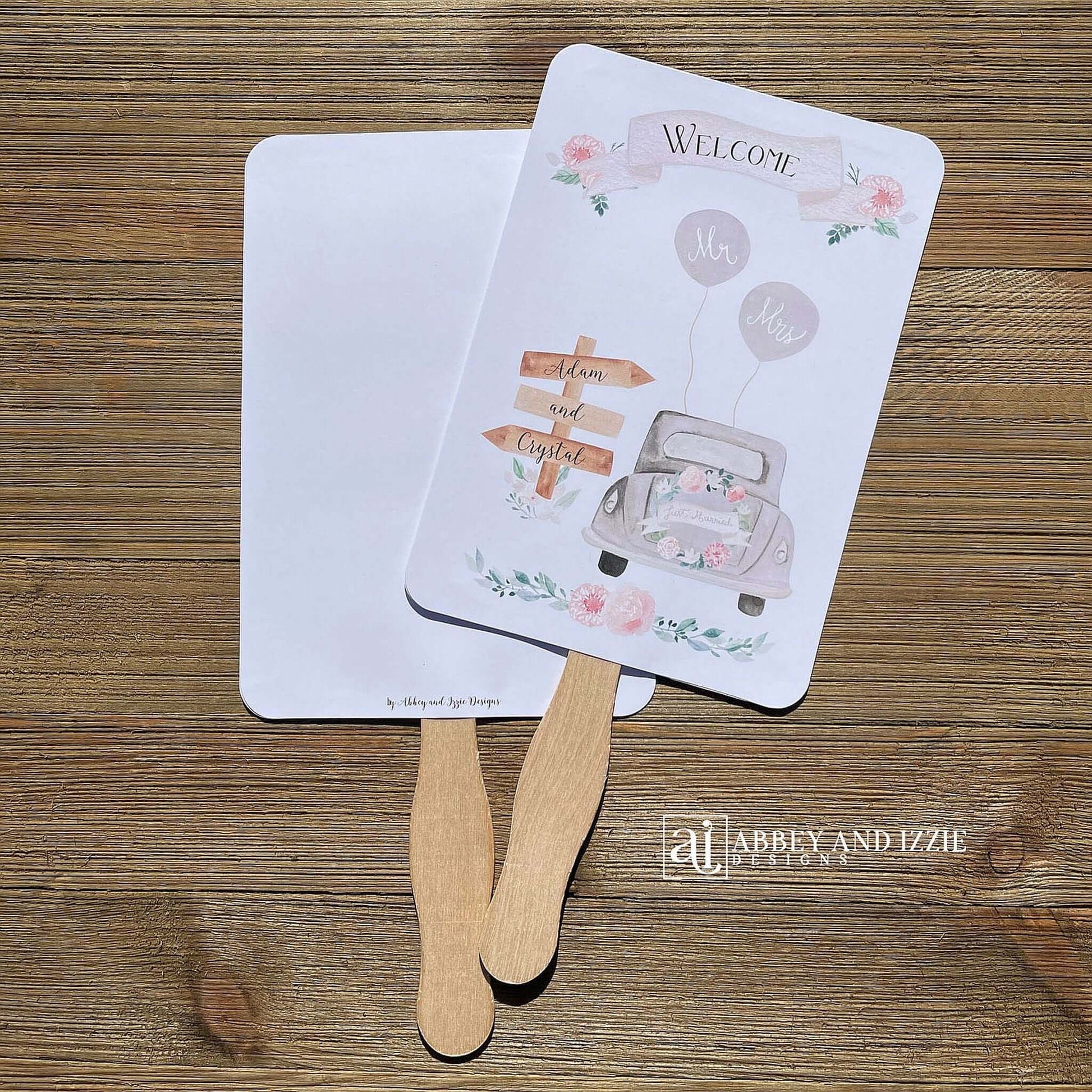 Fun Wedding Fans Personalized for the bride and groom.  Printed with Welcome and a old car with 'just married' on the back.  Fans ship fully assembled and ready for your wedding day.