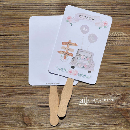 Fun Wedding Fans Personalized for the bride and groom.  Printed with Welcome and a old car with 'just married' on the back.  Fans ship fully assembled and ready for your wedding day.