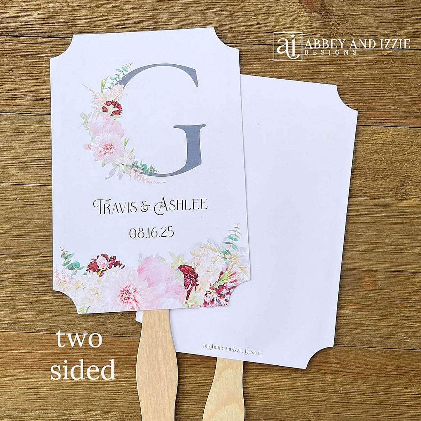 Monogram Wedding Fans, personalized for the bride and groom. Large initial highlighted by pink and burgundy floral. Fans ship fully assembled, 2 sided with hand hidden for a finished look.