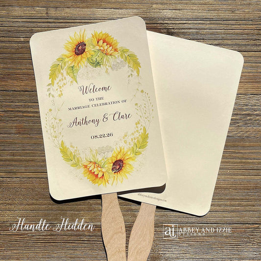 Sunflower Wedding Hand Fans Personalized , personalized for the bride and groom and adorned with a ring of sunflowers.  Fans are printed on ivory cardstock, two sided so handle is hidden between.  Wedding fans ship fully assembled and ready for your big day.