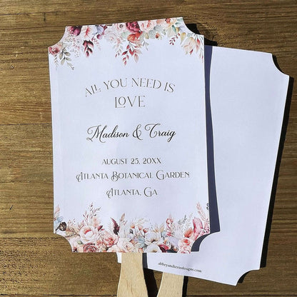 Mocha wedding fans, printed on white card stock with mocha flowers flowing from the top and bottom.  Personalized fans for you day.