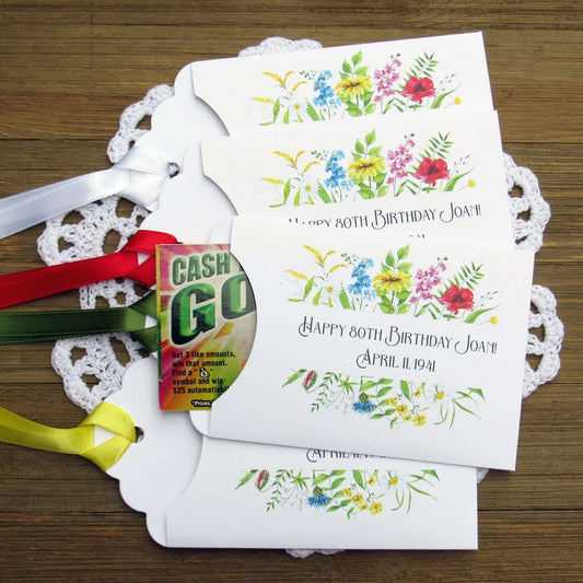 Floral Birthday Party Favors, slide a scratch off ticket in these cute envelopes to see who wins.  White envelopes with your choice of ribbon color, personalized for the guest of honor.