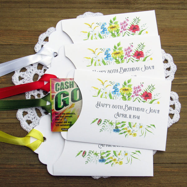 Wildflower birthday party favors, slide a scratch off ticket in these cute envelopes to see who wins.  White envelopes with your choice of ribbon color, personalized for the guest of honor.