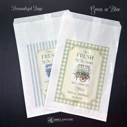 Our "Fresh Off The Market" bridal shower bags are the perfect keepsake for guests—ideal for holding treats, small gifts, or personalized tokens of appreciation.  Printed on white bags with your choice of blue or green flower carts.  Personalized with the brides name and shower date.